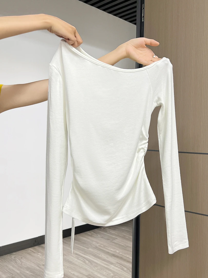 白色不规则斜肩长袖t恤2024秋季纯欲褶皱修身显瘦打底内搭上衣女