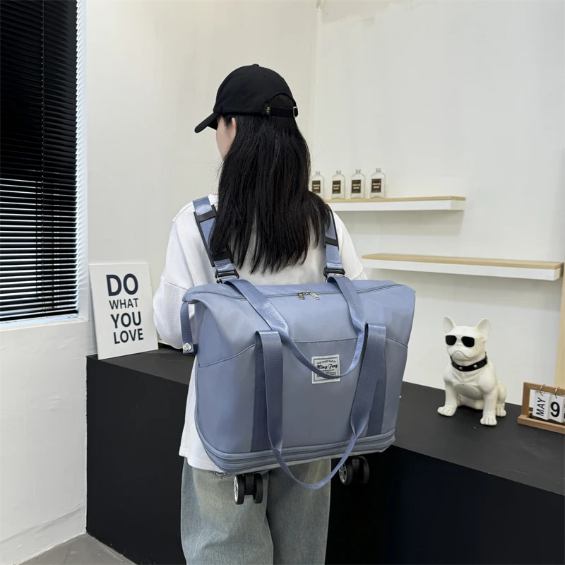 多功能韩版免托运登机包大容量行李包可装被子双肩背万向轮旅行包