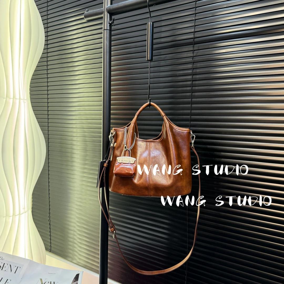 调调包包WANG STUDIO【质感绝！小众设计款RaneDona焦糖棕手提斜挎】