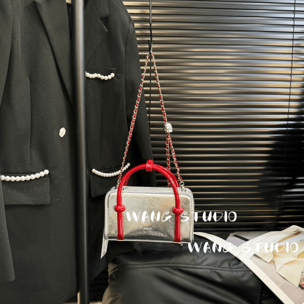 调调包包WANG STUDIO【！小众设计款 银色红手提波士顿】