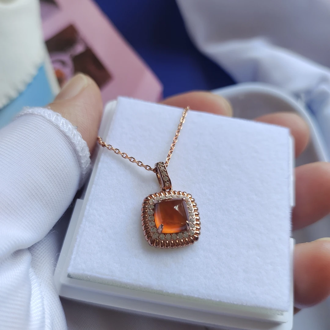 S925银镶嵌唐塔石榴石吊坠