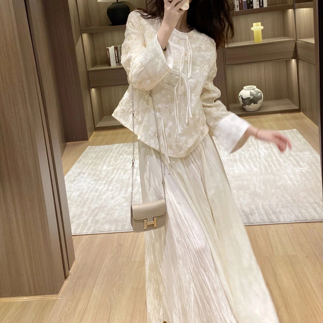 早春国风套装女2025新中式冷淡系高级感盘扣唐装上衣大摆裙两件套