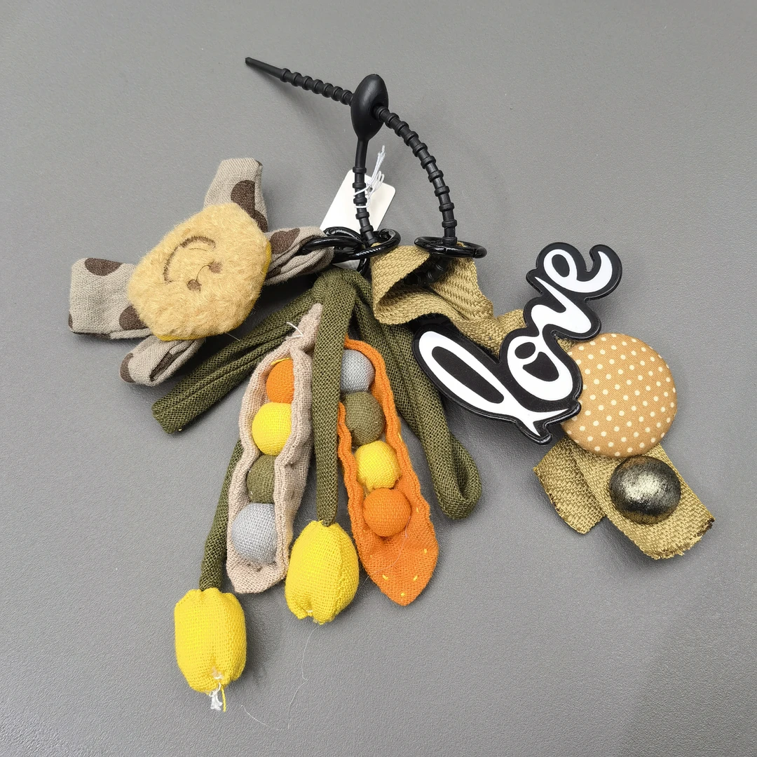 A840彩色豌豆笑脸包挂件