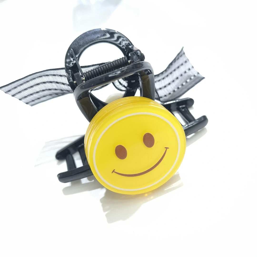 B227黄色多层笑脸AB面抓夹7.5厘米