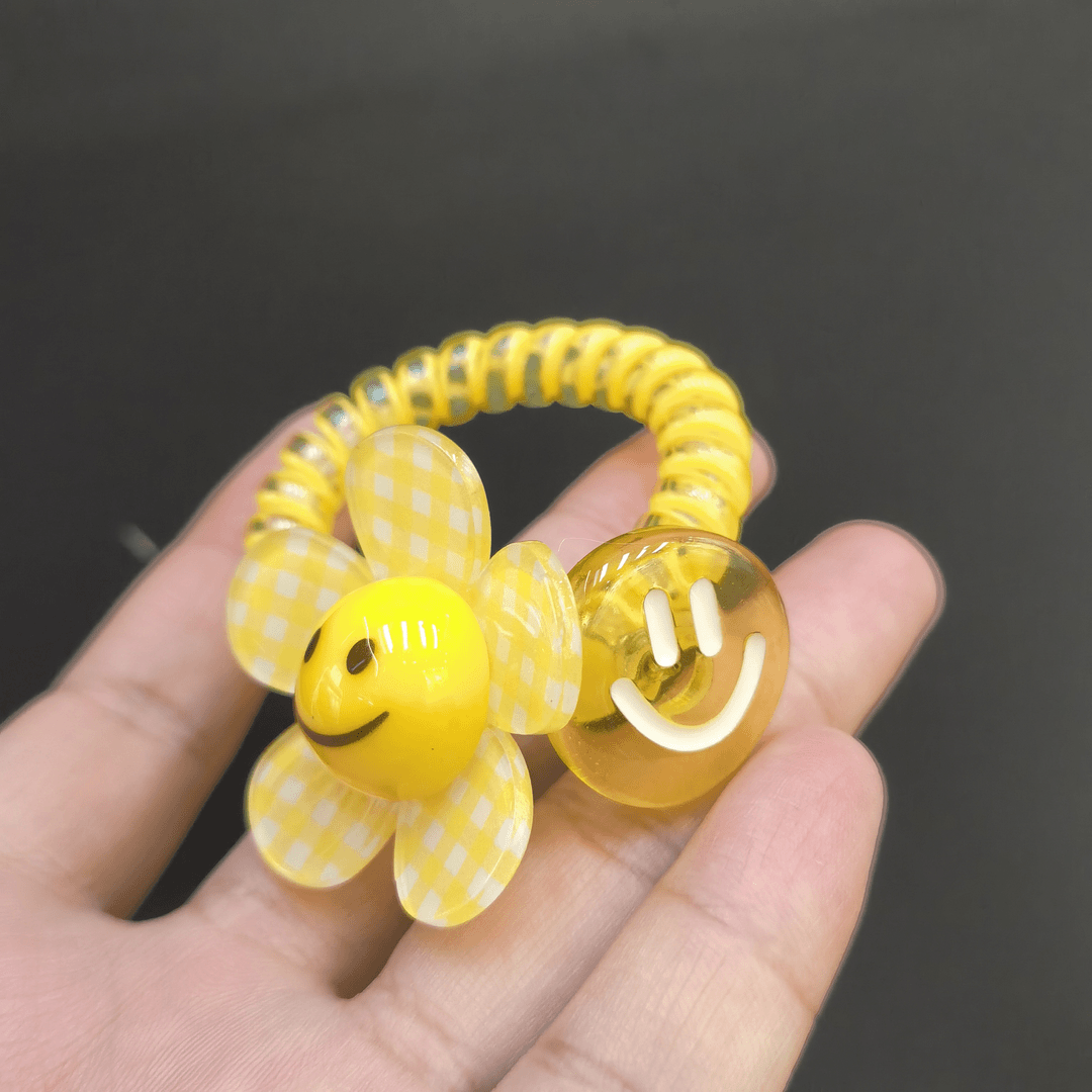 A618(满9.9包邮)黄色太阳花笑脸电话线发绳