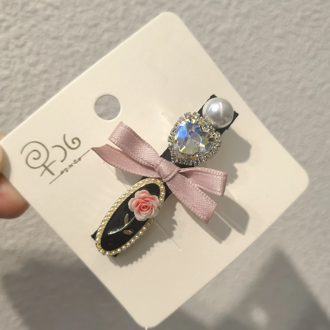 A521粉色蝴蝶结花花爱心边夹