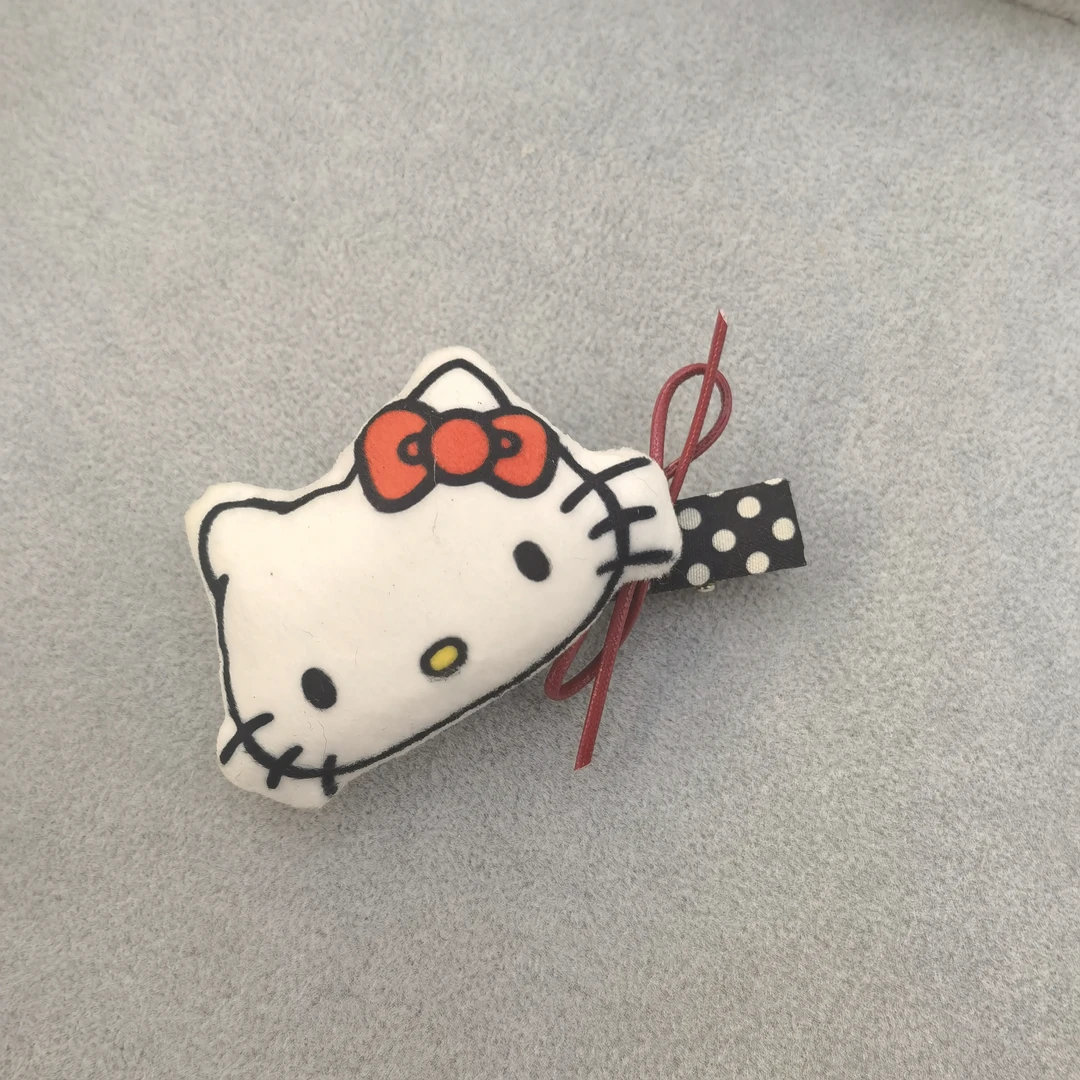 A169白色KT猫咪波点边夹