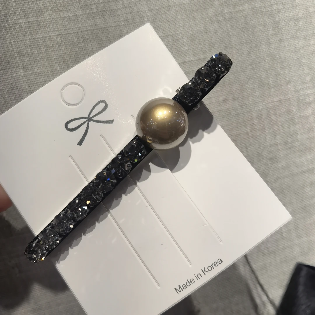 A912香槟色单珠长条告告边夹