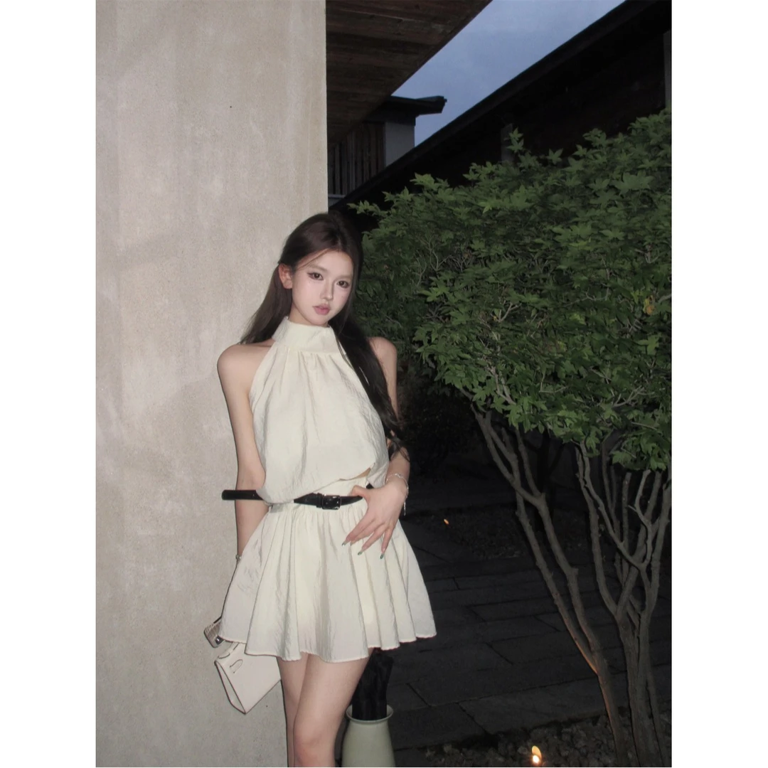 辣妹时尚套装女夏无袖挂脖上衣吊带背心短款花苞半身裙两件套ZC60