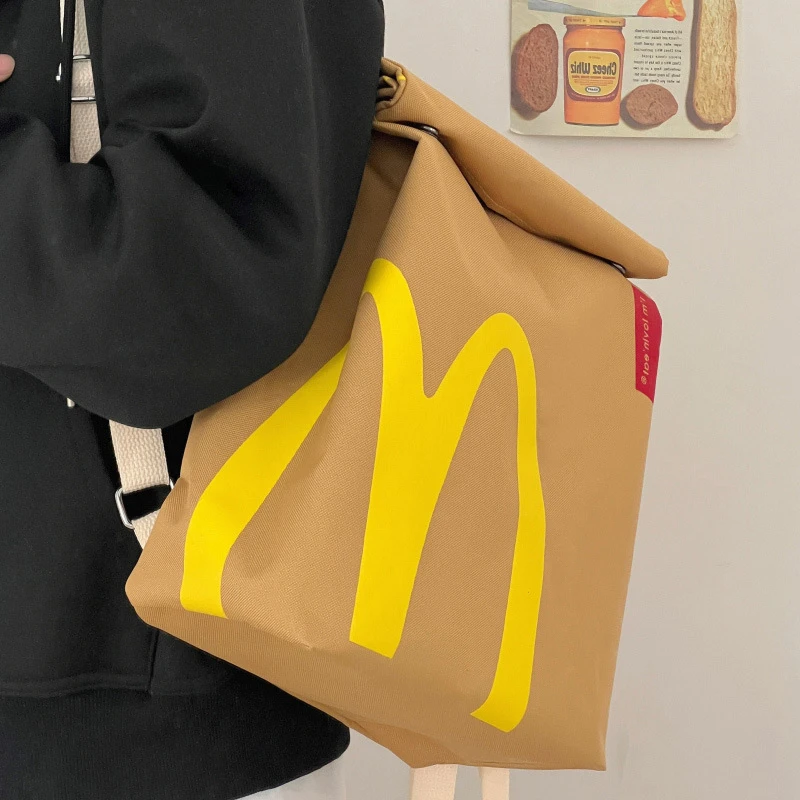 【艺凡】麦当劳尼龙创意书包个性大容量双肩包男女上课通勤双肩包