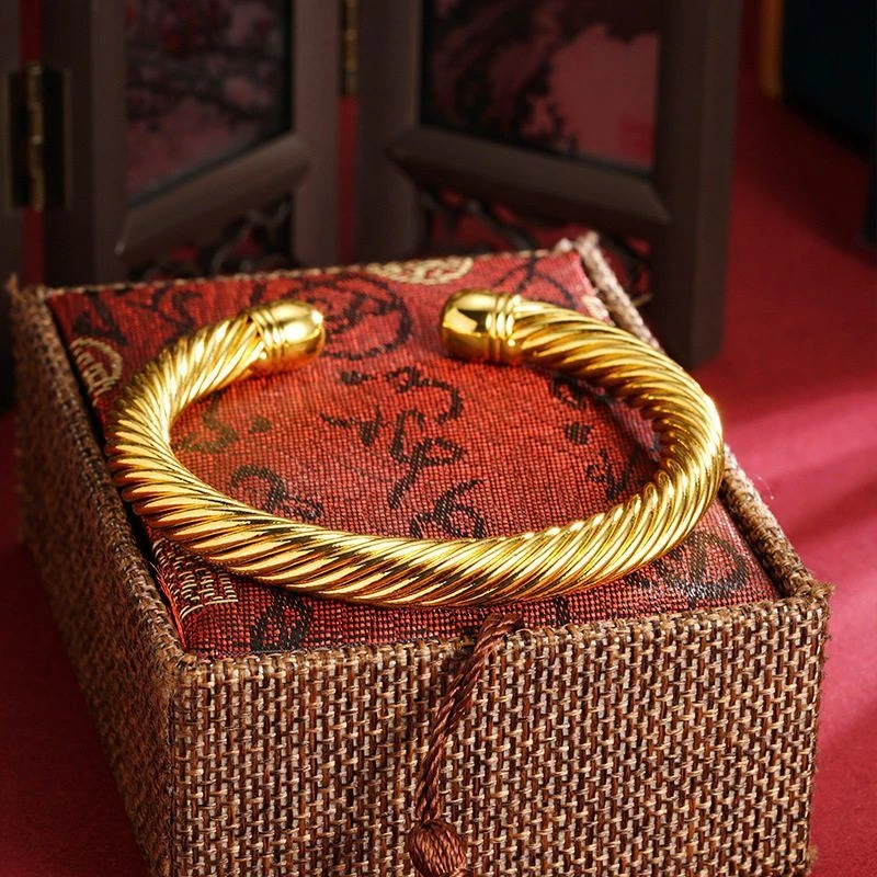 黄铜塑料手镯 新品手镯饰品时尚金色螺纹麻花镯子女感久不掉色