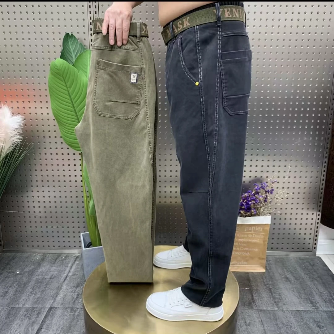 春秋男士宽松贴标牛仔老爹裤