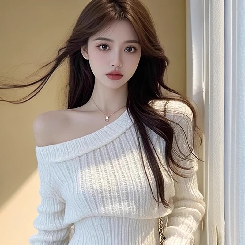 秋冬纯欲甜辣妹白色斜肩长袖针织打底衫女设计感修身高腰短款上衣