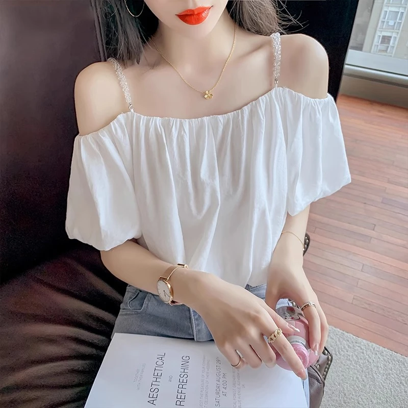 白色气质女短袖2025年新款夏季泡泡袖洋气显瘦小衫一字肩宽松上衣