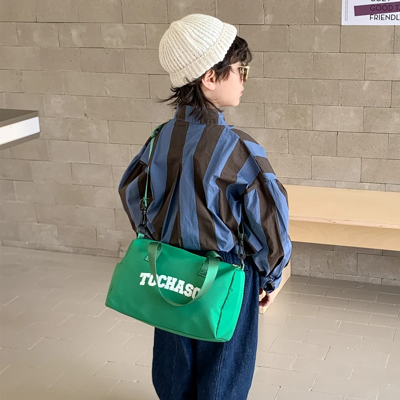 韩版儿童包包时尚字母男童单肩斜挎包休闲小女孩亲子外出帆布包潮