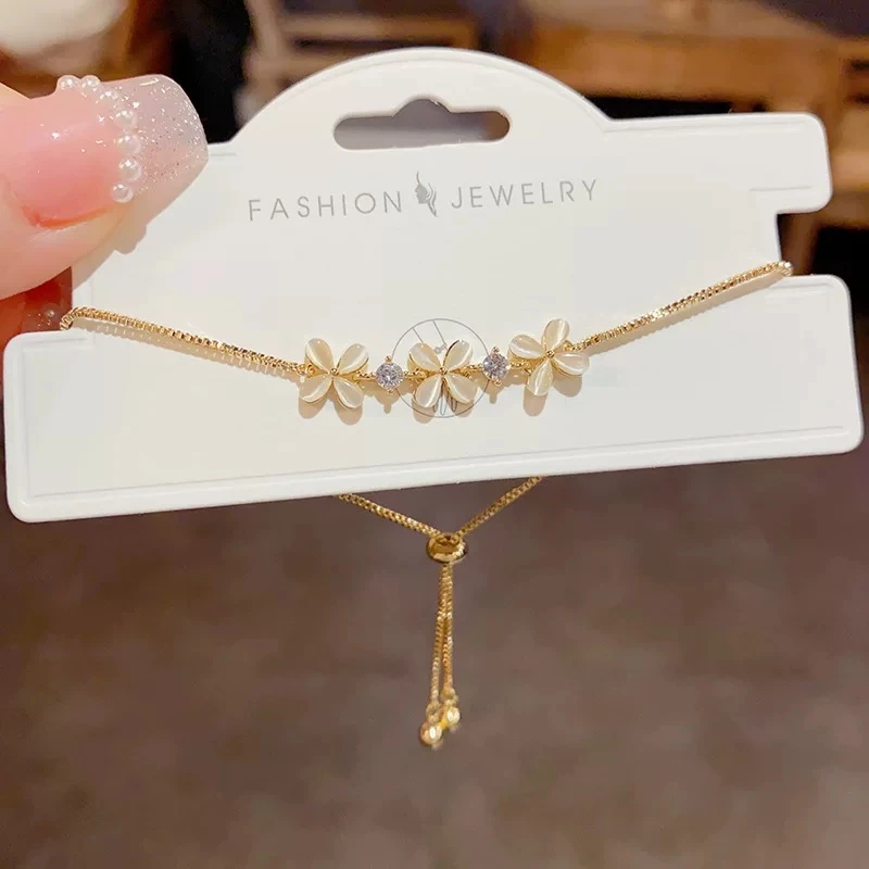 铜合金手链 气质抽绳喵喵石手链轻奢花朵精致手绳配饰F311