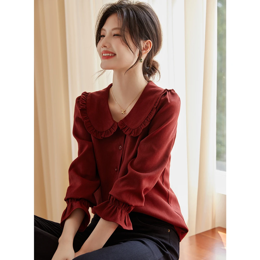 尚静新年红娃娃领复古风衬衫2025冬季新款时尚休闲气质喇叭袖上衣