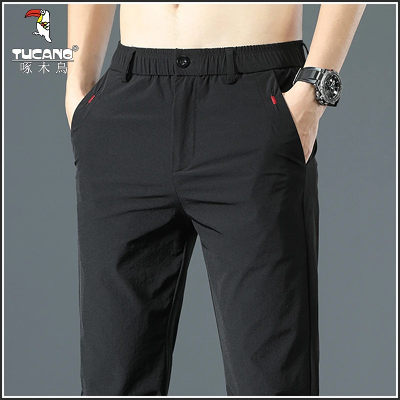 啄木鸟新款春夏季休闲裤男士修身直筒冰丝薄款弹力速干简约长裤子