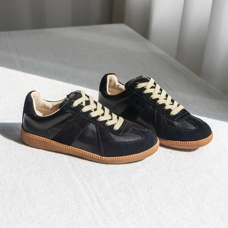2024春季新款真皮德讯鞋女平跟防滑拼色百搭情侣款休闲小白鞋黑色