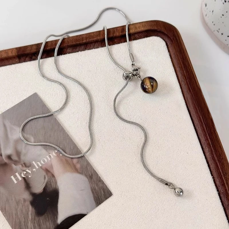 钛钢项链  美拉德银色蛇骨长款抽拉毛衣链女秋冬复古高级感项链