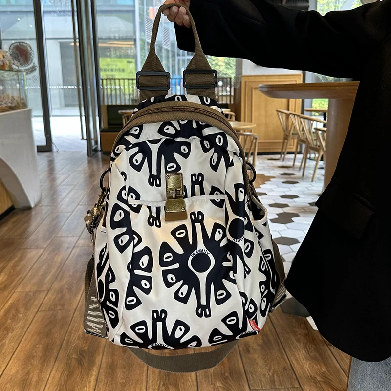 潮牌印花大容量双肩包2025新款女时尚休闲牛津布女士背包旅行书包