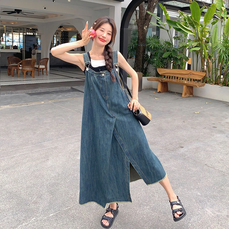 蓝色小众设计感牛仔背带裙女中长款202夏新款宽松减龄开叉连衣裙