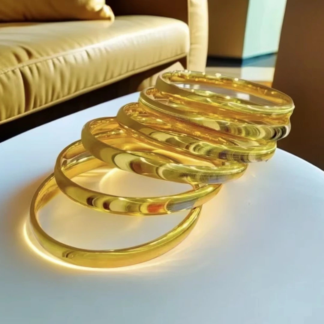 铜合金手镯 亮面猫眼手镯女素圈婚嫁礼物三万块钱左右的镯子经典