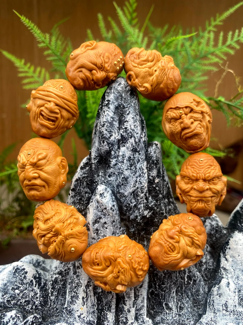 核雕，镶嵌九尊者橄榄核雕手串