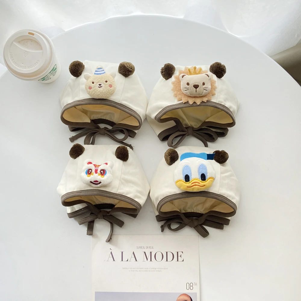 奶白色婴儿帽子春秋款男女童小月龄宝宝护耳帽双球拼色可爱包头帽