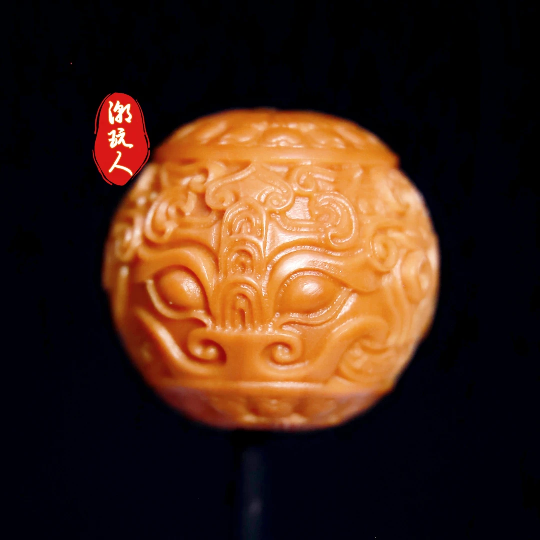 D008 青铜兽面顶珠橄榄核单粒