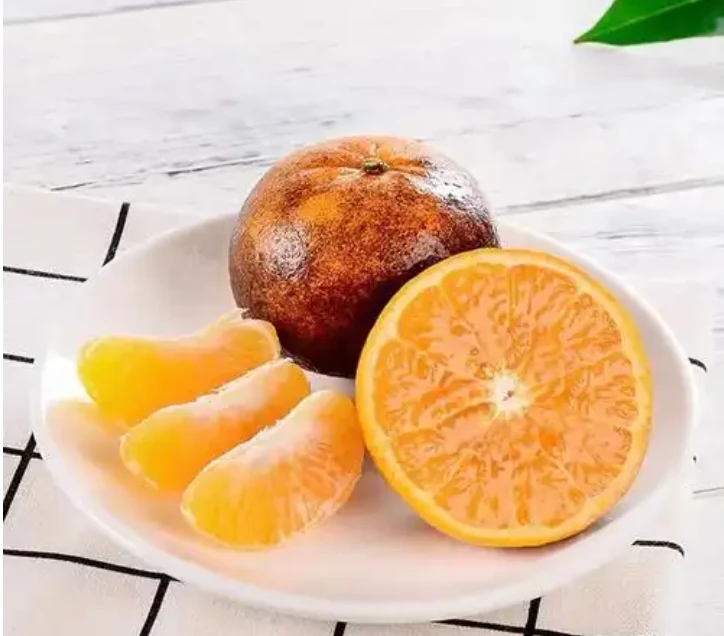 广西正宗乌柑新鲜大果非洲黑柑丑沃柑橘子现采现摘当季丑橘