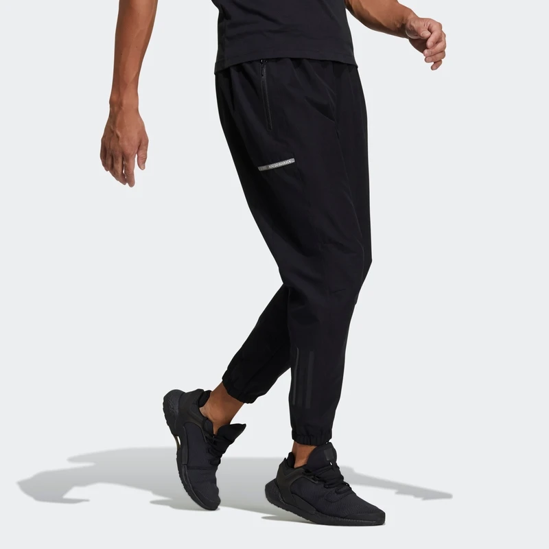 Adidas/阿迪达斯 男女同款透气梭织速干冲锋裤运动长裤 GP0958