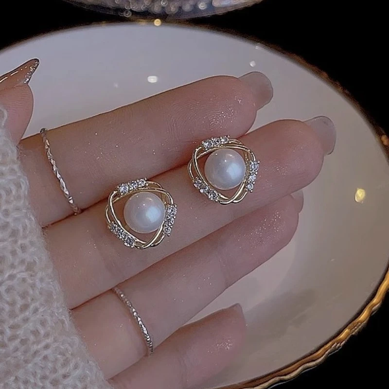 镂空珠珠耳钉新款潮旋转耳饰女气质耳环简约百搭网红送女友七夕