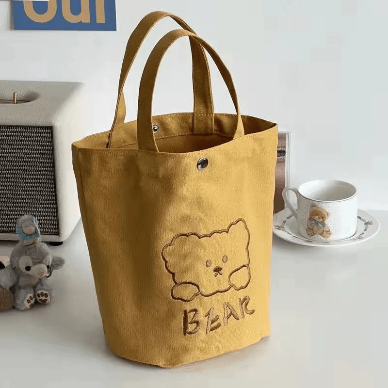 日系刺绣小熊水桶型托特帆布包简约百搭小容量手提便当包餐盒女包