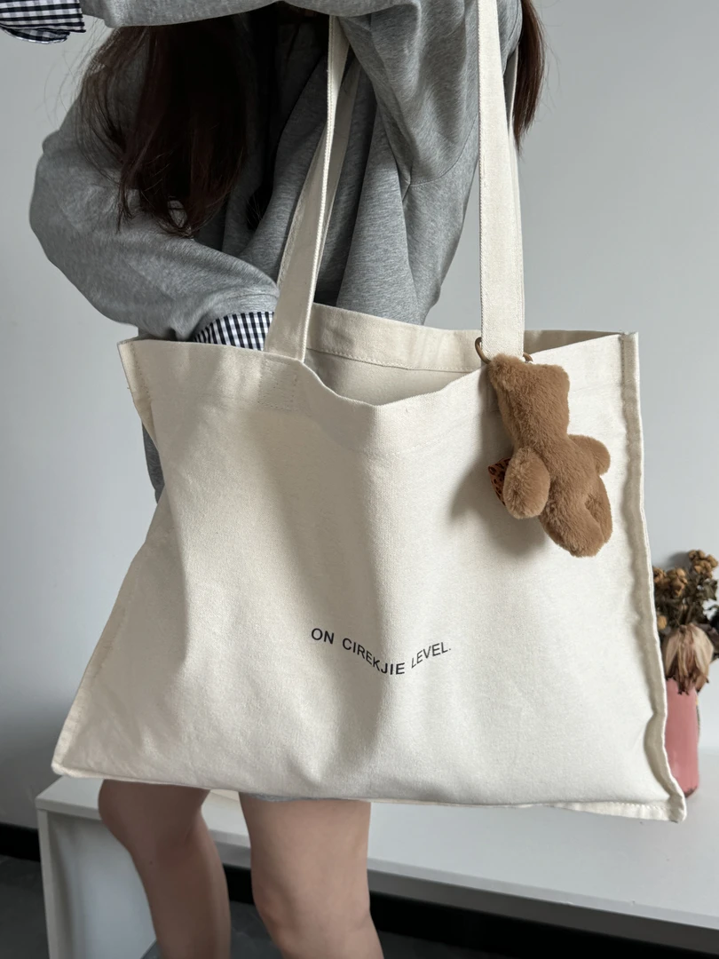 【菜芽子】简约英文字母帆布包2025新款百搭大容量女休闲单肩托特包