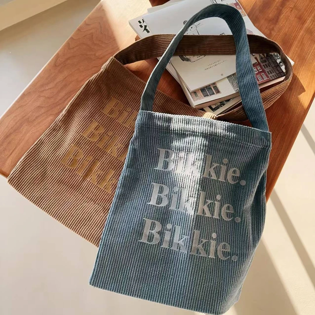 BIKKIE新海盐奶咖色系字母灯芯绒单肩包轻便大容量通勤包休闲包女