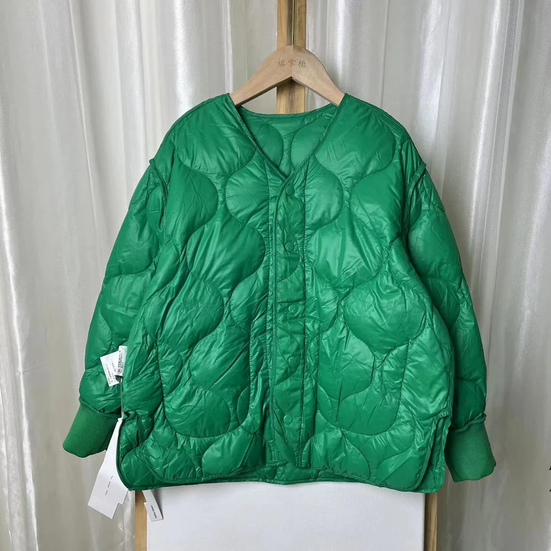 938绿色羽绒服1094