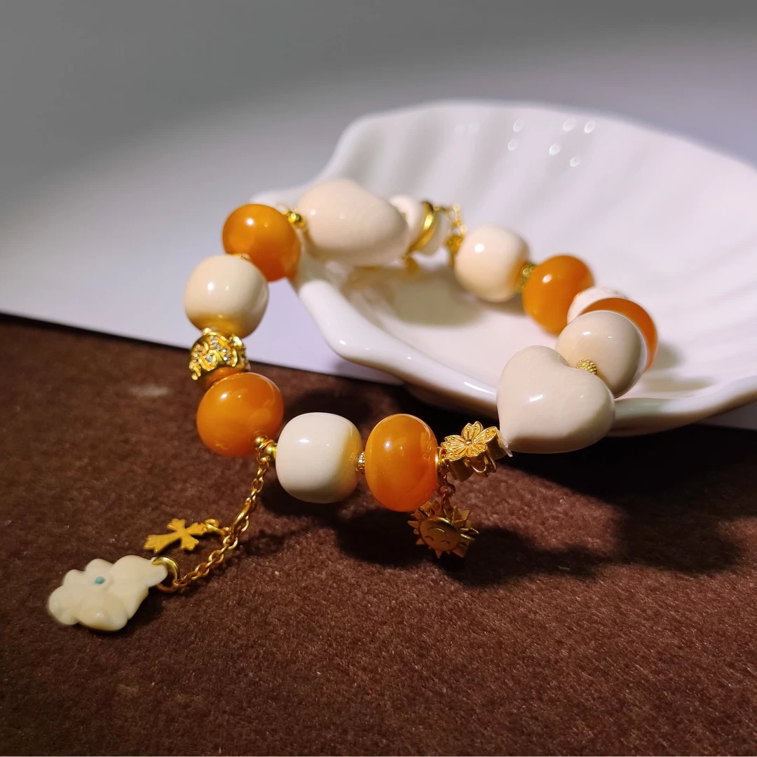 猛犸牙爱心蜜蜡手串KT24110807