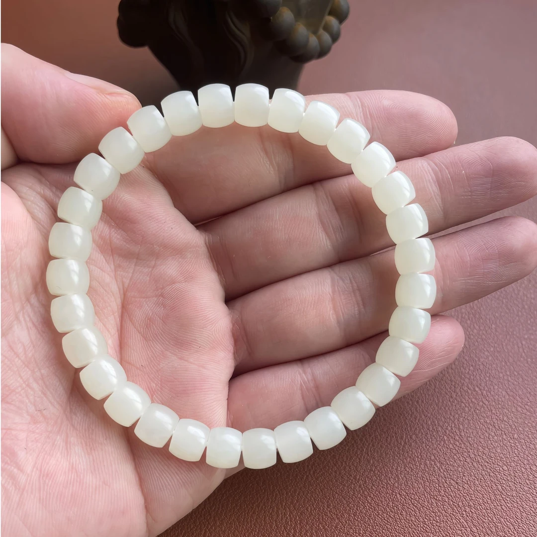 新疆和田玉山流水7.7x6.5精工直切手串