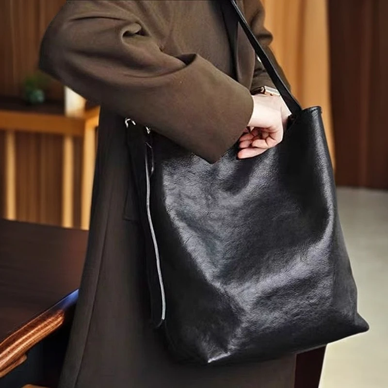 植鞣欧美复古水桶包单肩包时尚小众肩包女士托特包百搭黑色真皮