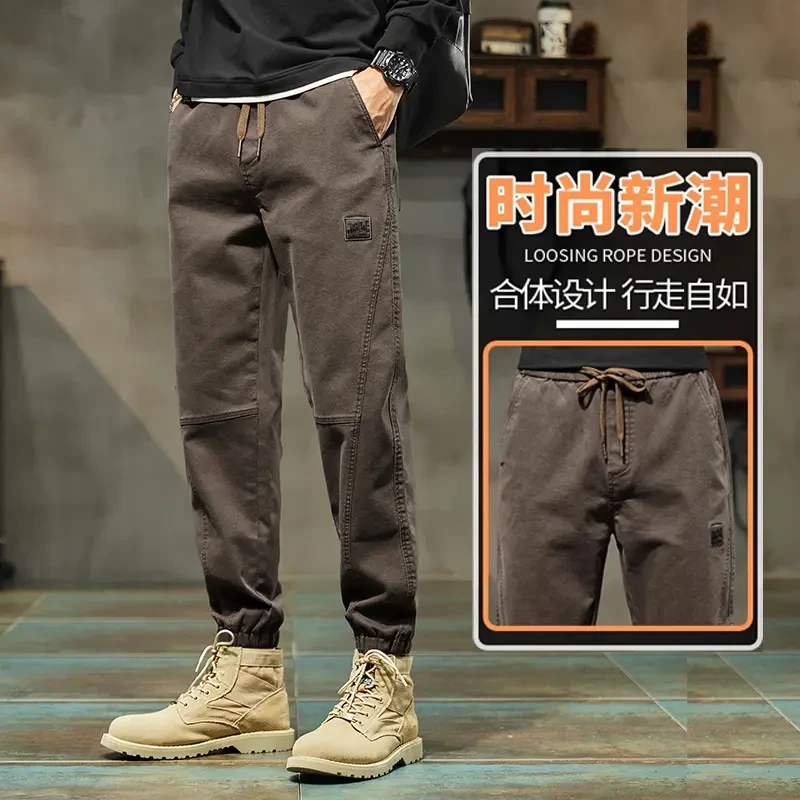 真维斯Jeanswest/品牌休闲裤男春秋款束脚裤拼接宽松潮流厚款长裤