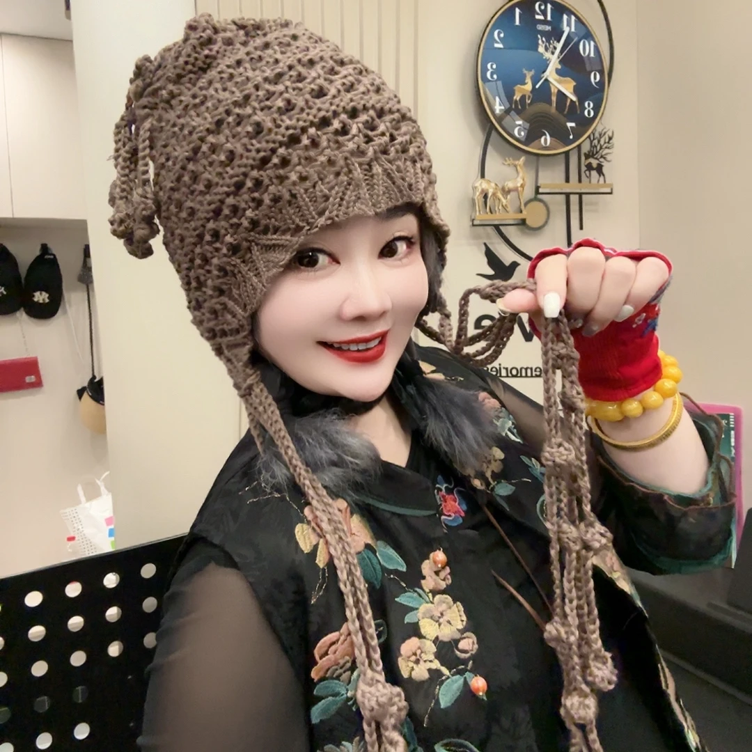 秋季时尚手工编织流苏球球毛线帽子女保暖护耳绑带针织帽
