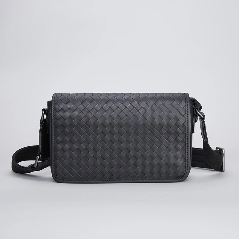 高品质男士新款手工编织胎斜挎小包真皮潮流休闲时尚