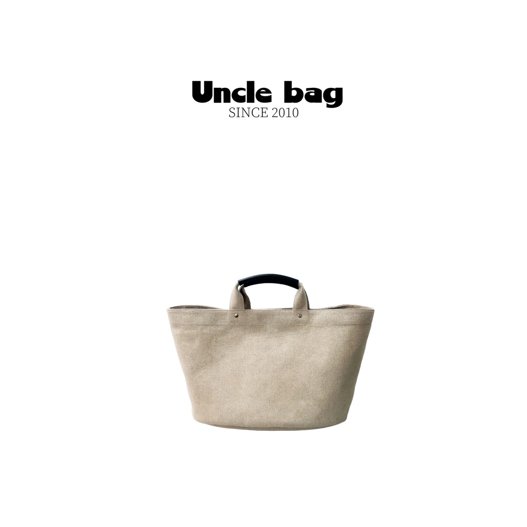 2店-新款简约休闲女水桶包大容量手拎包