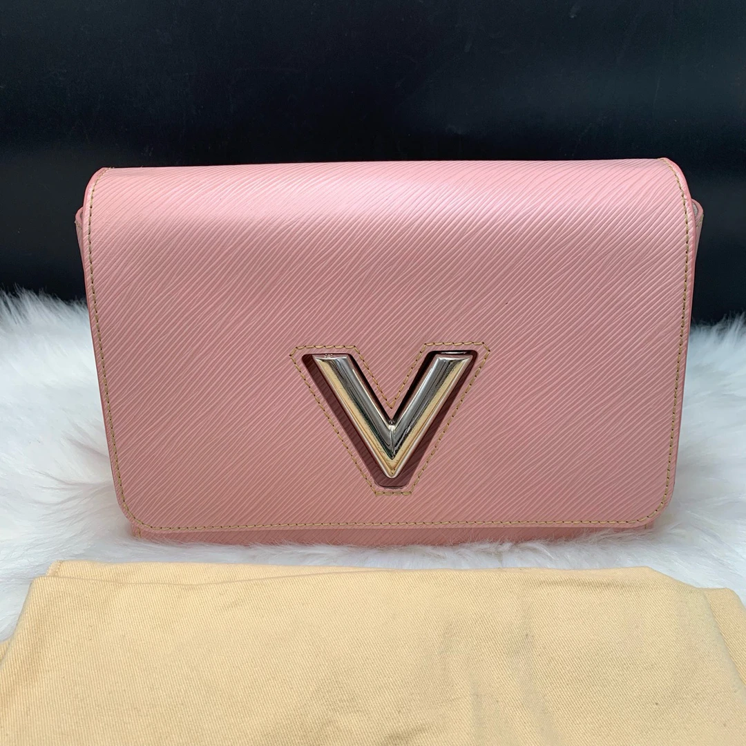 95新 LouisVuitton/路易威登 粉色水波纹斜挎包