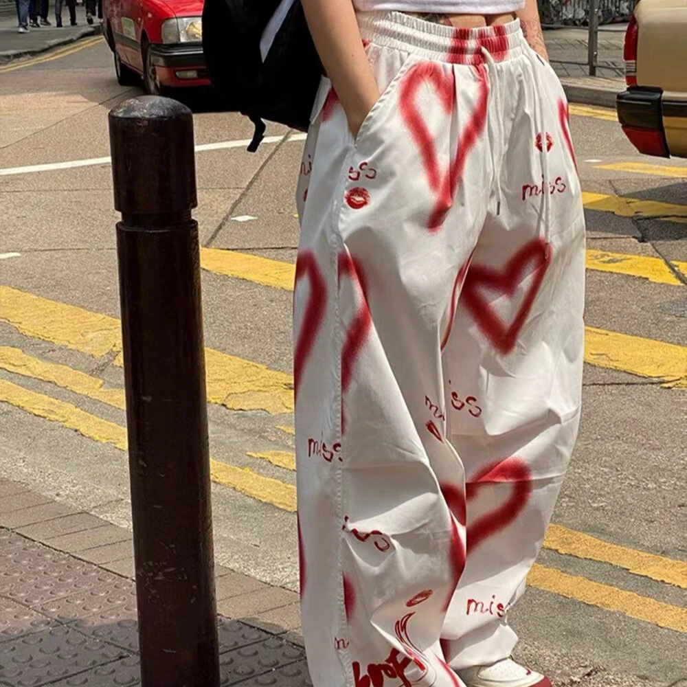 TEEINXX 爱心涂鸦印花休闲街头长裤NZ075