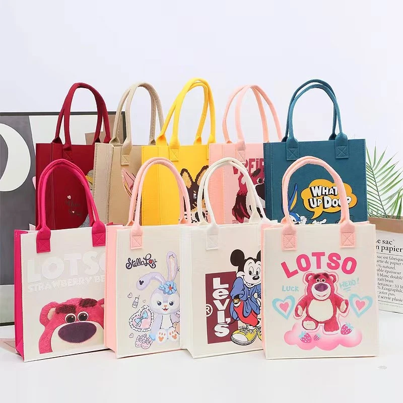 新款网红印花毛毡包学生手提包超萌卡通