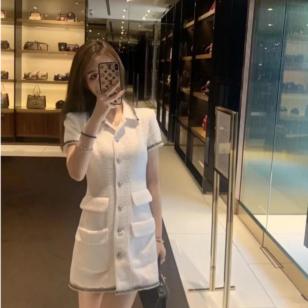 95新 Chanel/香奈儿 屋顶白色软尼四口袋短袖连衣裙/34码/623