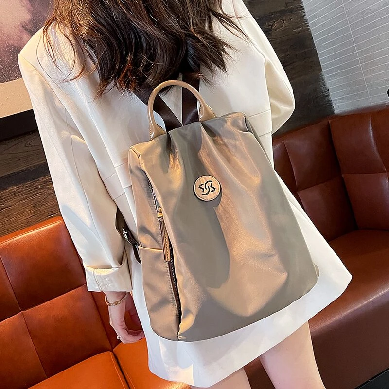 2025新款时尚潮流高级感牛津布双肩包女包休闲简约防盗背包旅行包