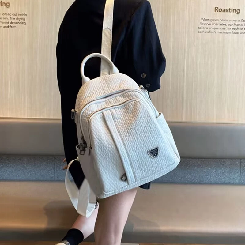 新款2025简约多功能真皮双肩包女包高档百搭软皮大容量背包旅行包